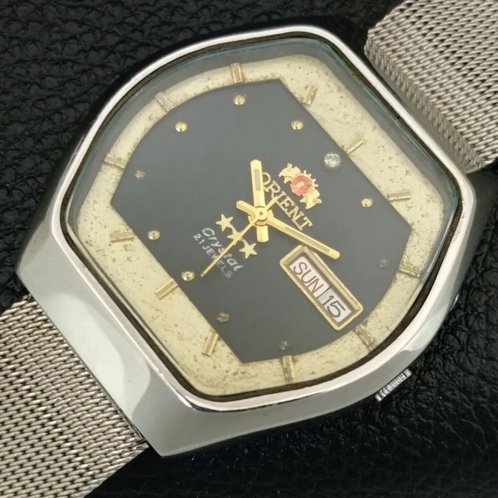 Vintage 1981 Orient Automatic Mens Silver Watch W/daydate & Gold accents